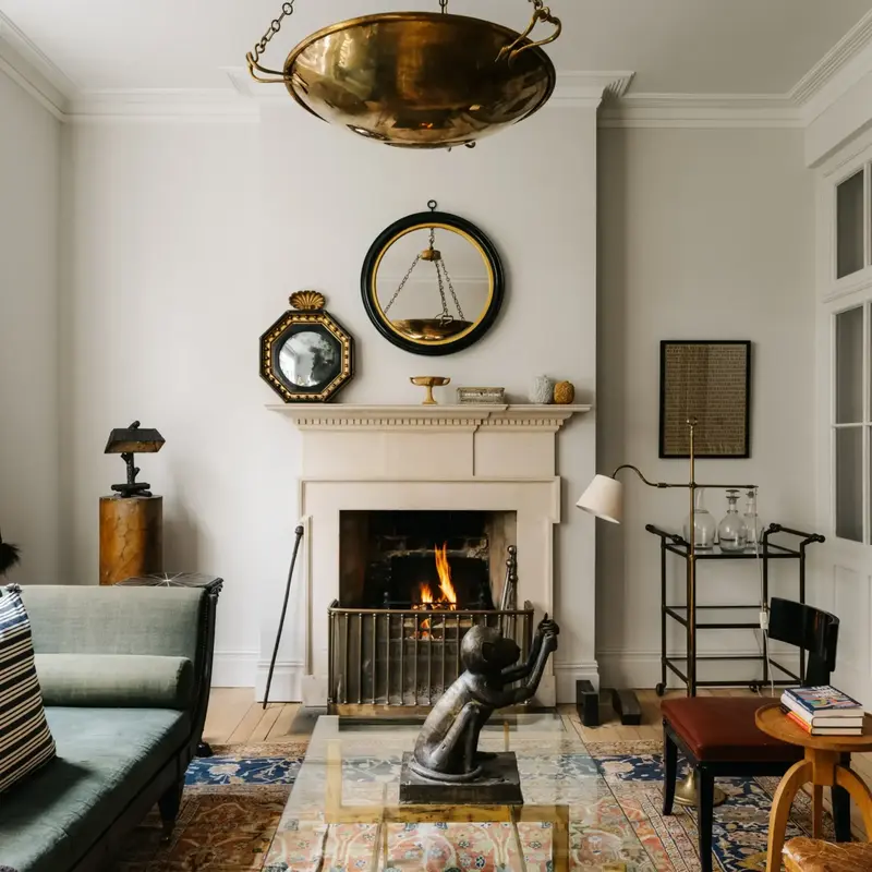 fireplace with statue in front